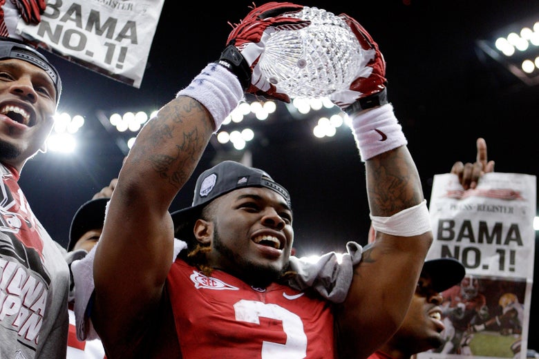 NEW ORLEANS, LA - JANUARY 09: Trent Richardson #3 of the Alabama Crimson Tide celebrates with the trophy after defeating Louisiana State University Tigers in the 2012 Allstate BCS National Championship Game at Mercedes-Benz Superdome on January 9, 2012 in New Orleans, Louisiana. Alabama won the game by a score of 21-0. (Photo by Andy Lyons/Getty Images)